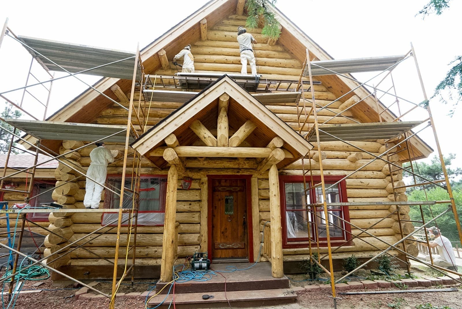 Restored log home wall in Colorado after structural log replacement