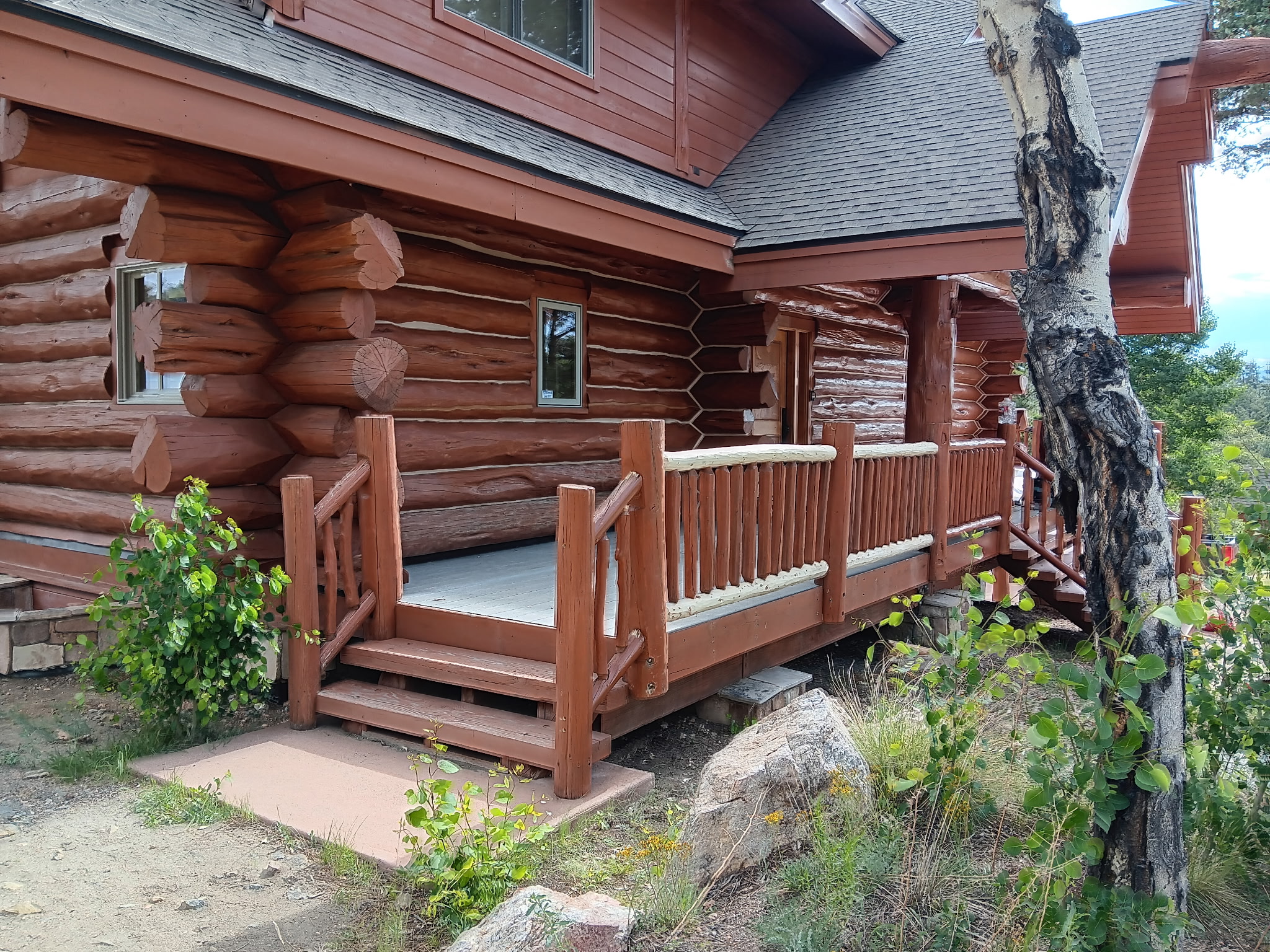 Professional log railing installation with hidden fastener systems